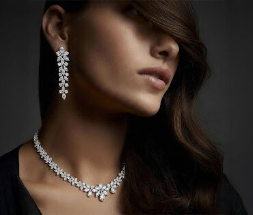 Ouros Jewels luxury lab grown diamond jewelry set featuring choker necklace and statement earrings